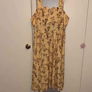 Yellow Dress with a brown floral print no size tag measurements show a size 18